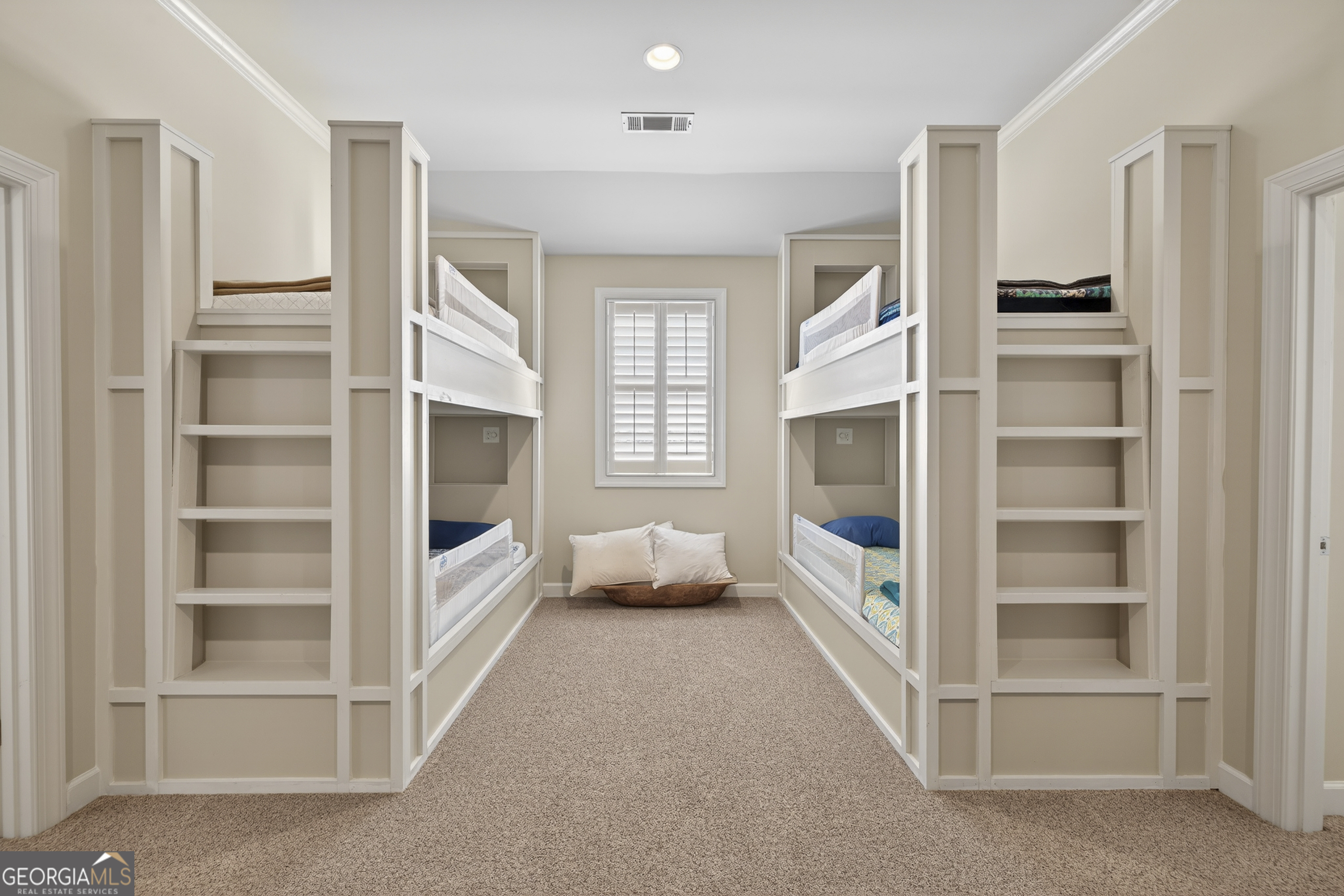 238 Cold Branch Road Eatonton, GA 31024 - Photo 43 of 104 a living room with a fireplace cabinet and a flat screen tv