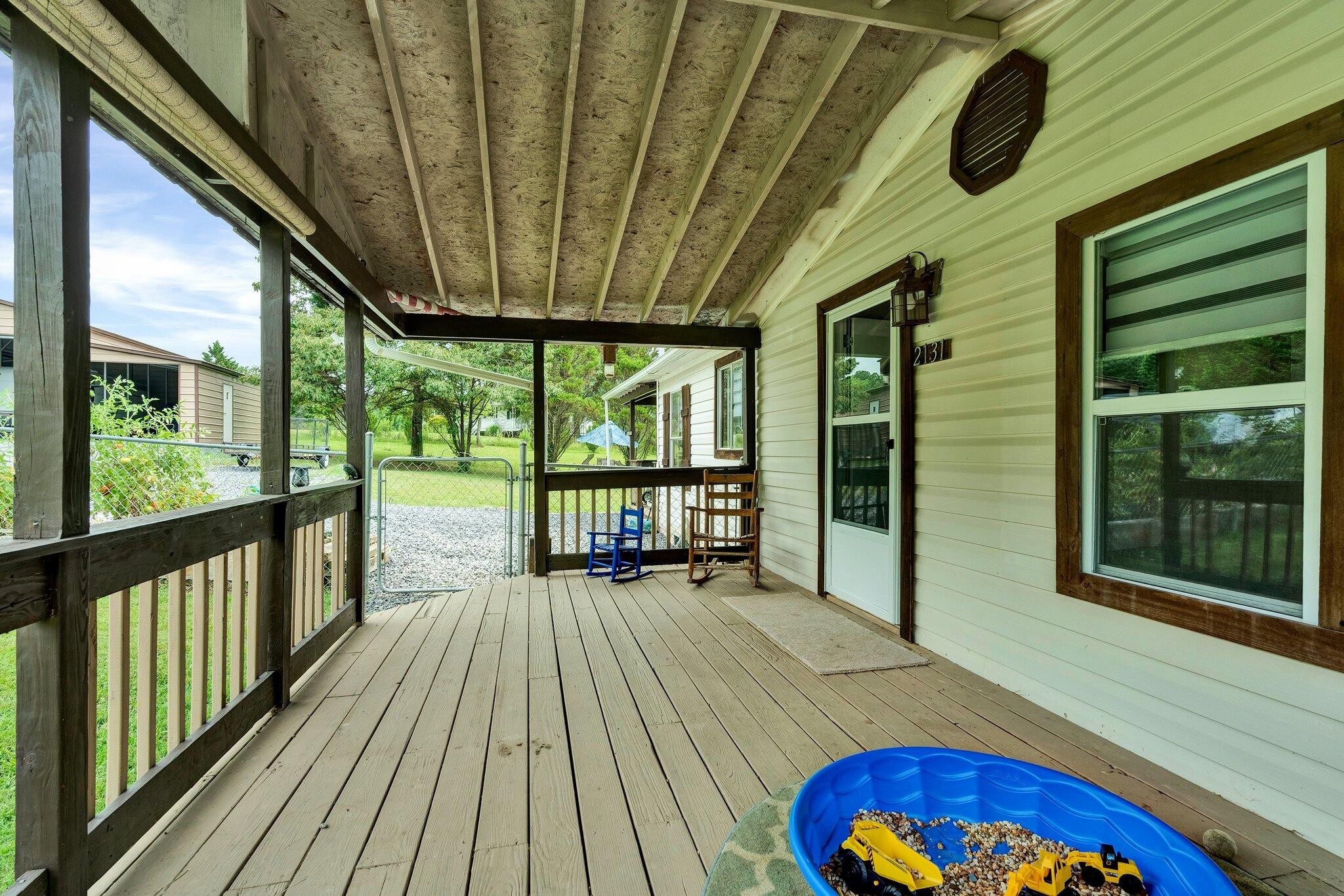 2131 Southeast Hunt Road Cleveland, TN 37323 - Photo 24 of 38 a view of balcony with wooden floor