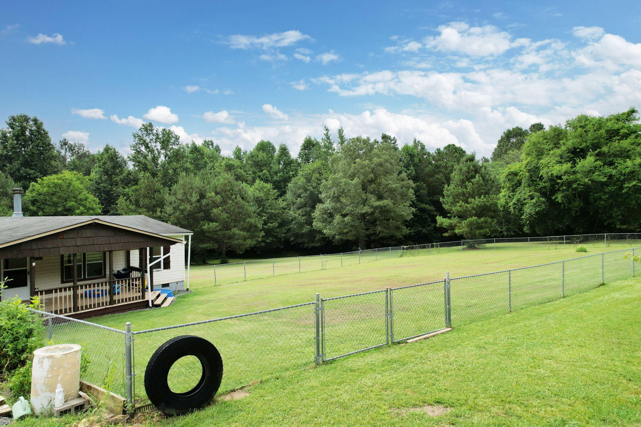 2131 Southeast Hunt Road Cleveland, TN 37323 - Photo 29 of 38 a view of an house with backyard space and balcony