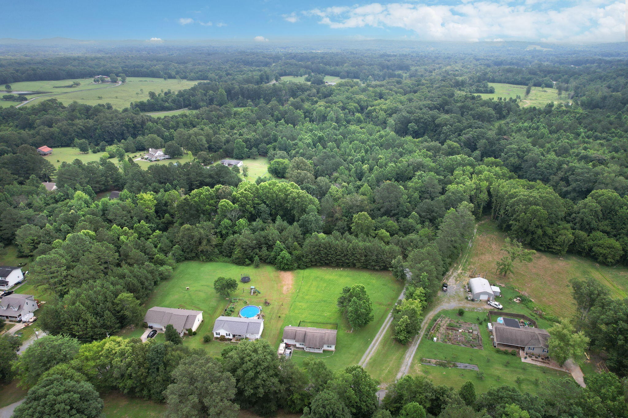 2131 Southeast Hunt Road Cleveland, TN 37323 - Photo 36 of 38 an aerial view of a house with a yard