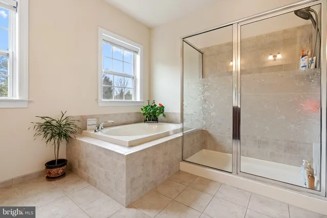 a bedroom with a bed and cabinets