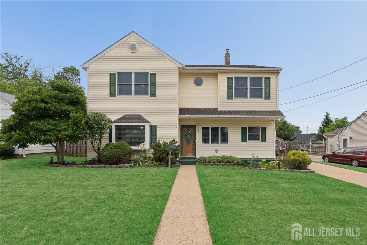 45 Walnut Street Edison, NJ 08817 - Photo 1 of 28 a front view of a house with a yard