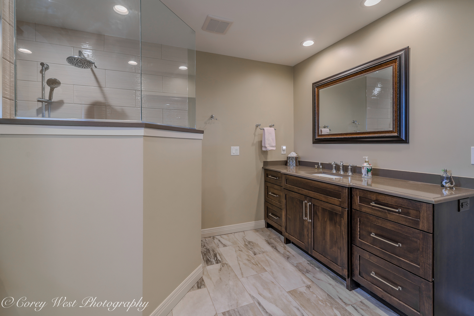 N004 Alexander Drive Geneva, IL 60134 - Photo 33 of 75 a bathroom with a sink and a mirror