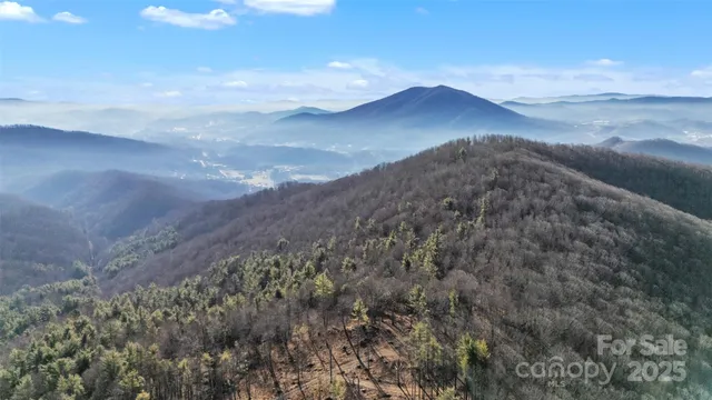 a view of mountains and valleys