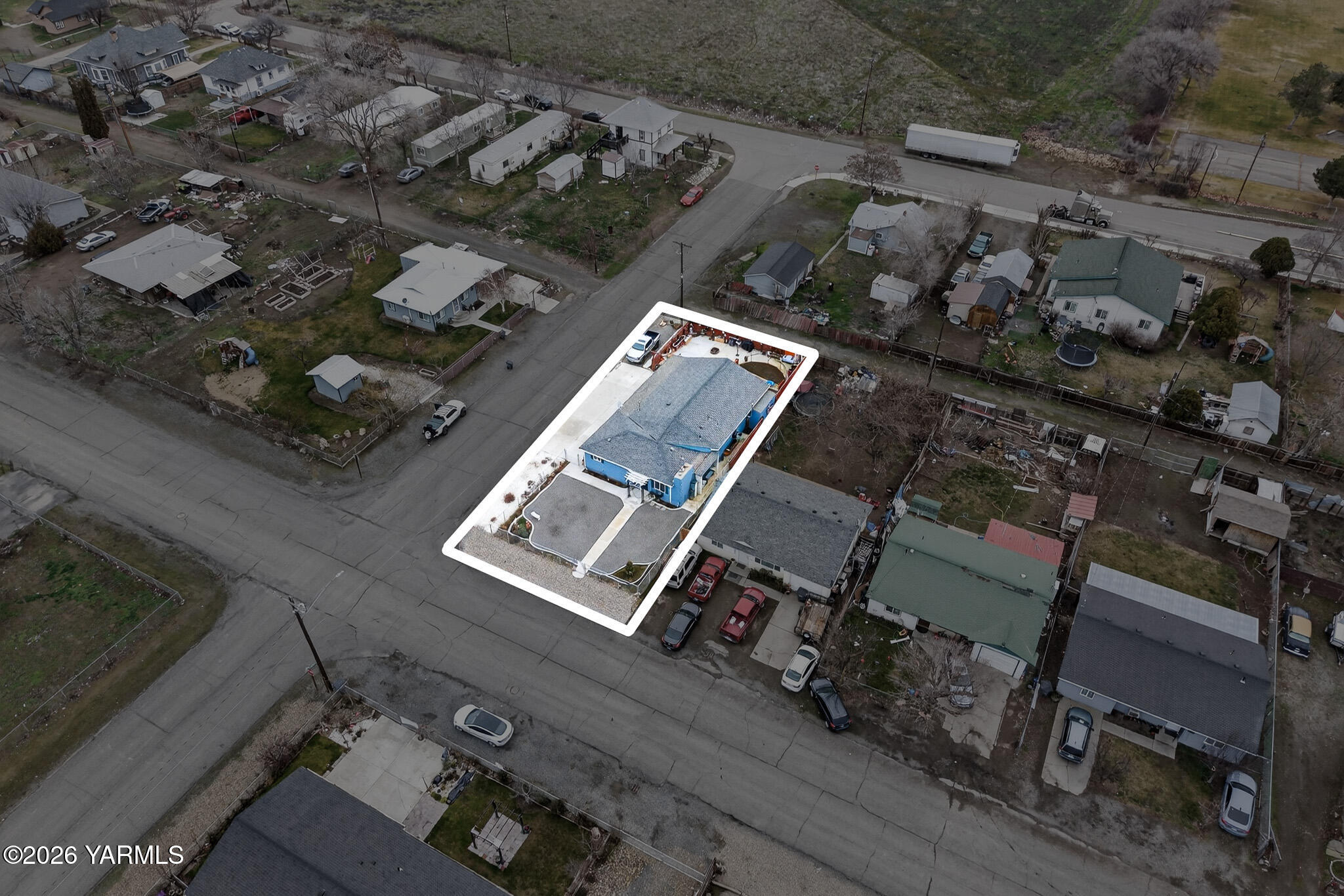 232 6th Avenue Mabton, WA 98935 - Photo 31 of 35 an aerial view of a house with outdoor space
