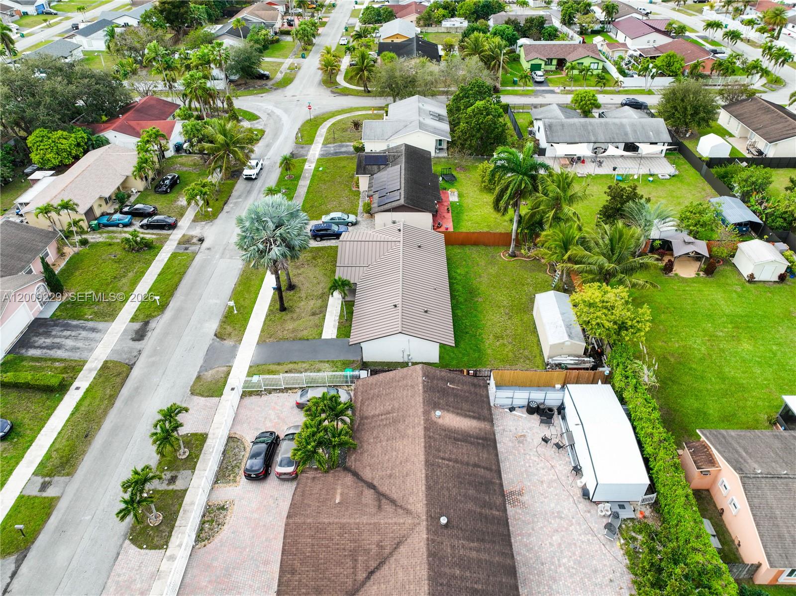 13251 Southwest 254th Terrace Homestead, FL 33032 - Photo 11 of 21 an aerial view of a house with a garden