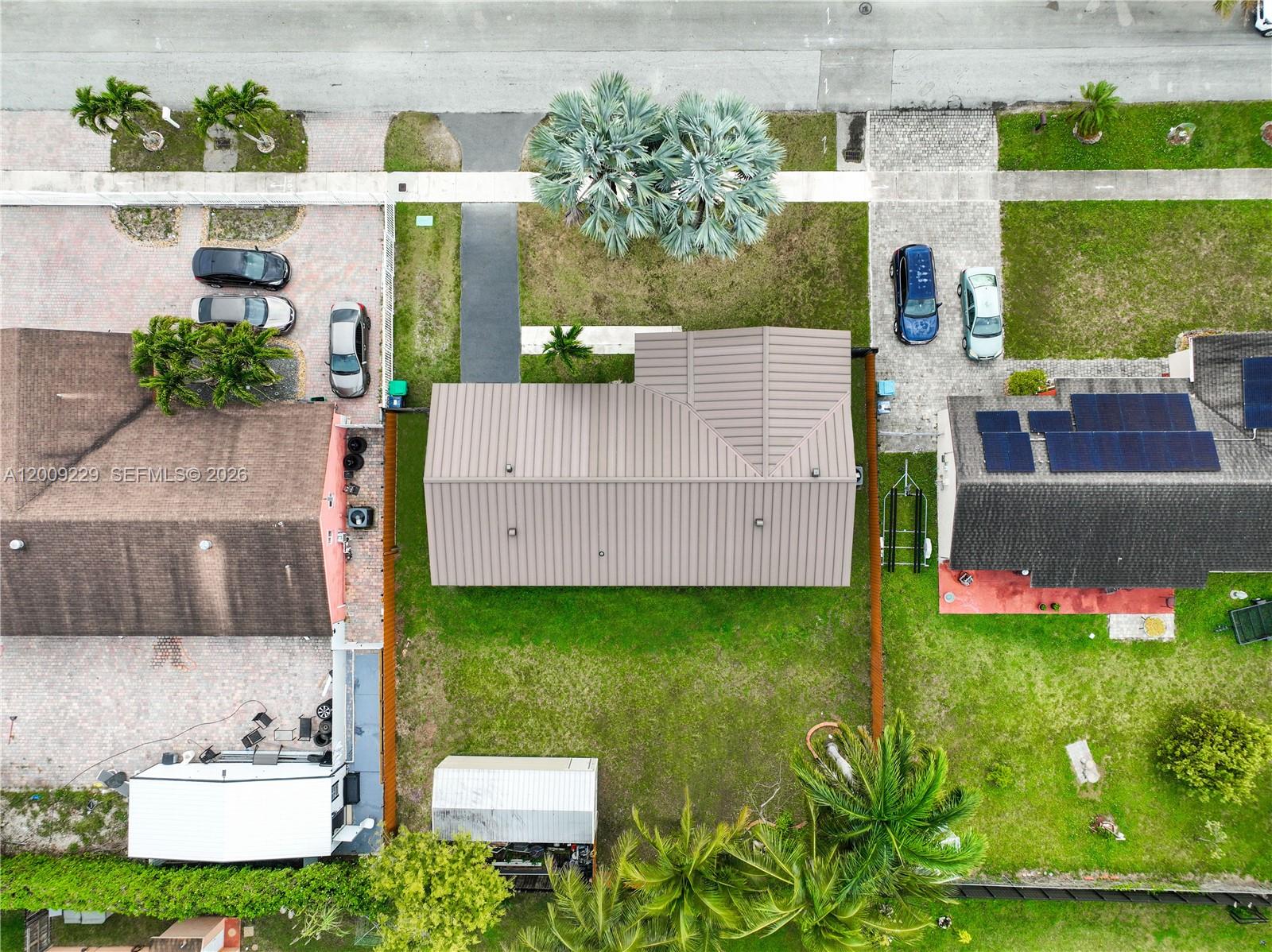 13251 Southwest 254th Terrace Homestead, FL 33032 - Photo 12 of 21 a view of a house with a yard and sitting area