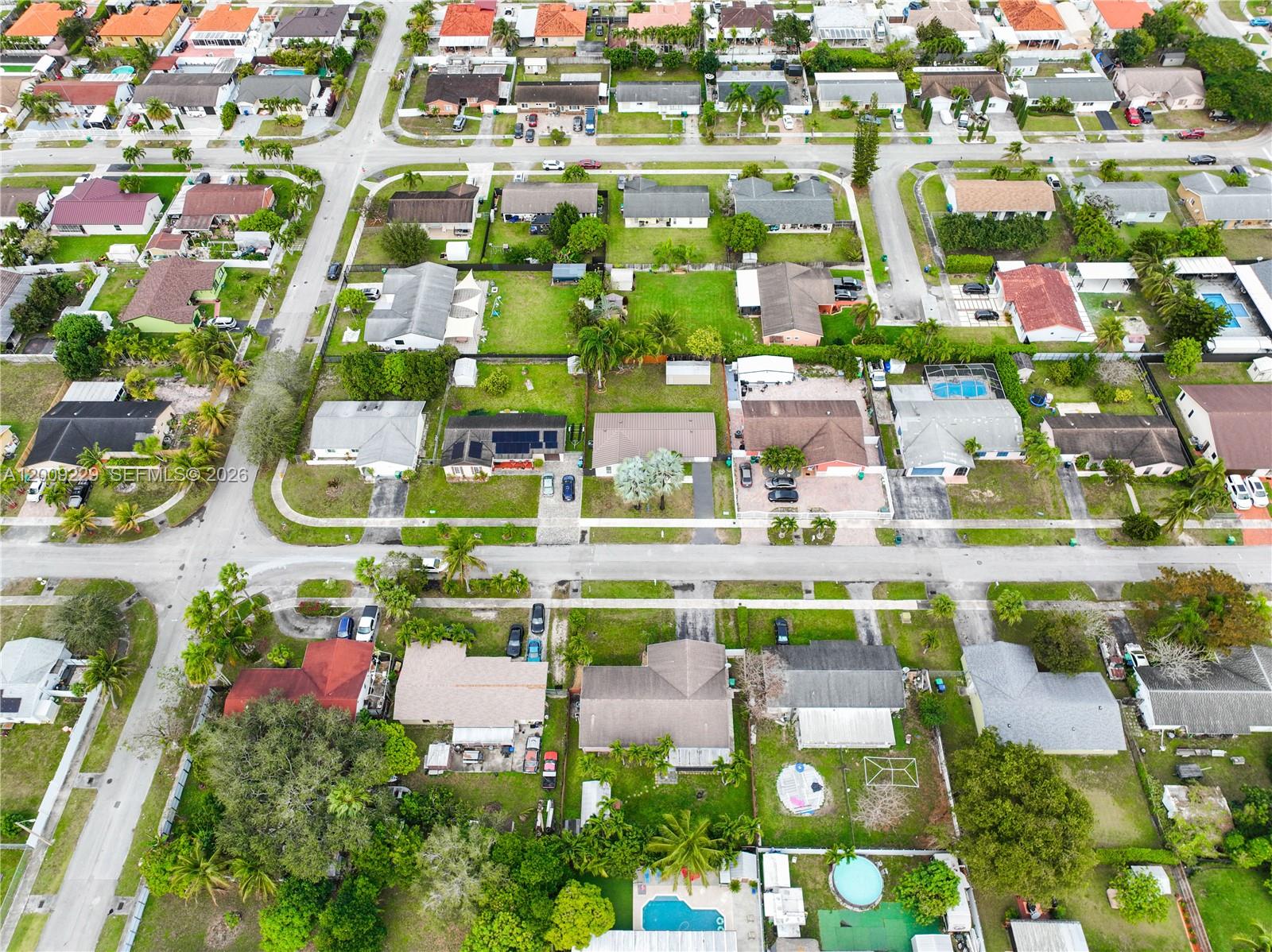 13251 Southwest 254th Terrace Homestead, FL 33032 - Photo 15 of 21 a picture of houses with outdoor space