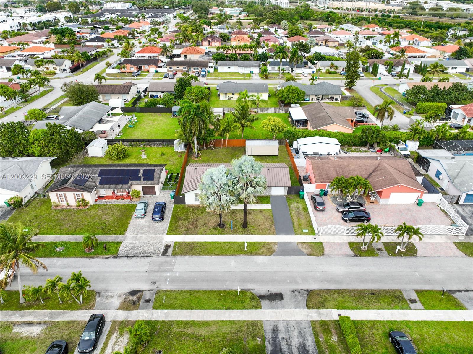 13251 Southwest 254th Terrace Homestead, FL 33032 - Photo 16 of 21 an aerial view of a city