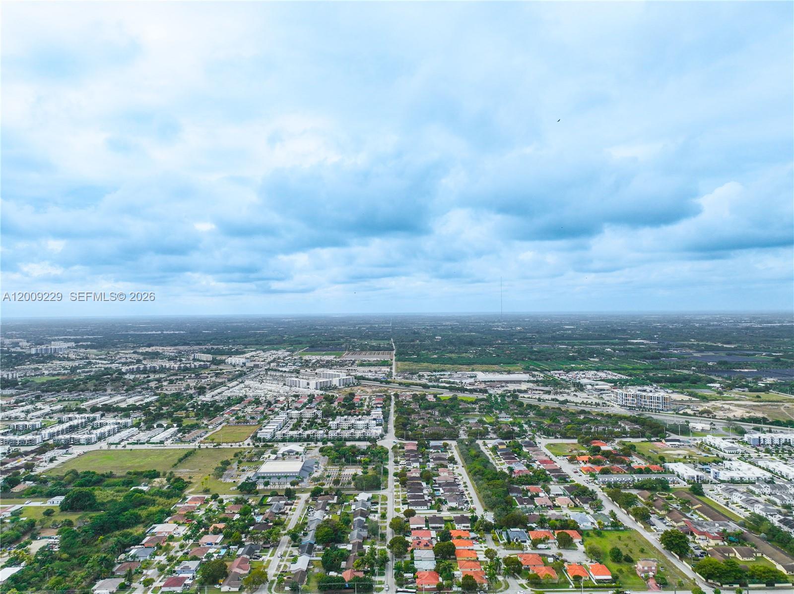 13251 Southwest 254th Terrace Homestead, FL 33032 - Photo 19 of 21 an aerial view of residential building with yard