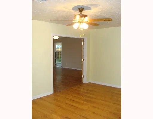 a view of a livingroom with wooden floor