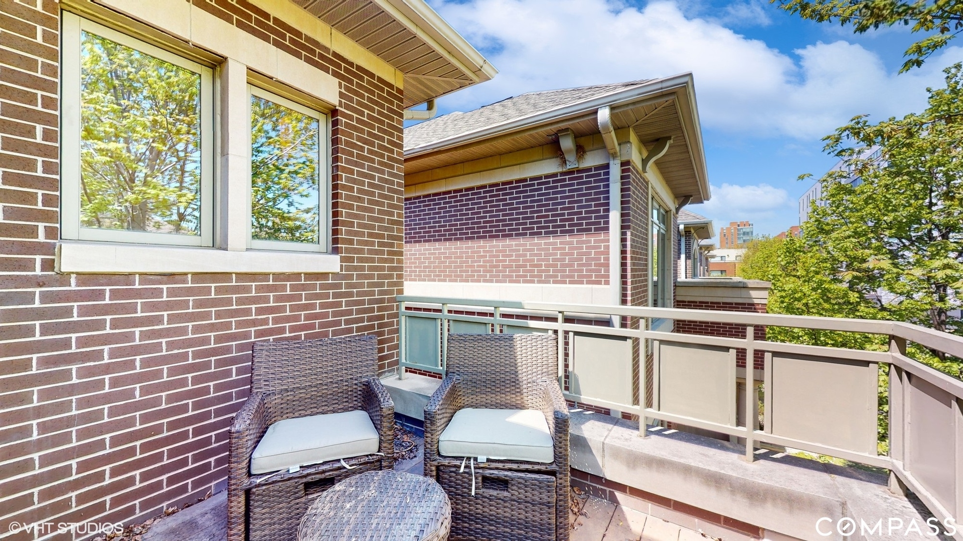 1412 South Emerald Avenue Chicago, IL 60607 - Photo 14 of 33 a view of a chairs and table in the balcony