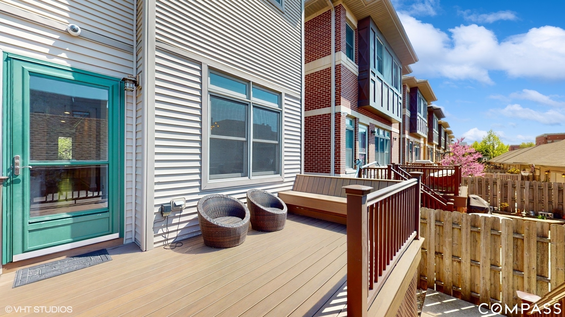 1412 South Emerald Avenue Chicago, IL 60607 - Photo 27 of 33 a view of a patio with a table and chairs and potted plants