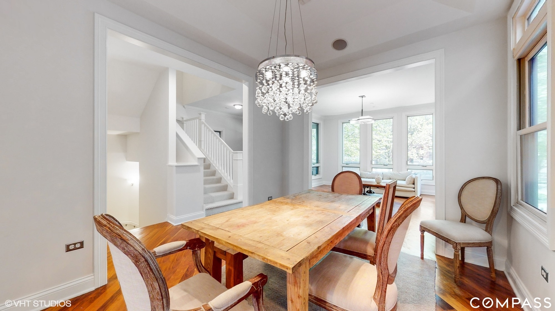 1412 South Emerald Avenue Chicago, IL 60607 - Photo 4 of 33 a view of a dining room with furniture and chandelier