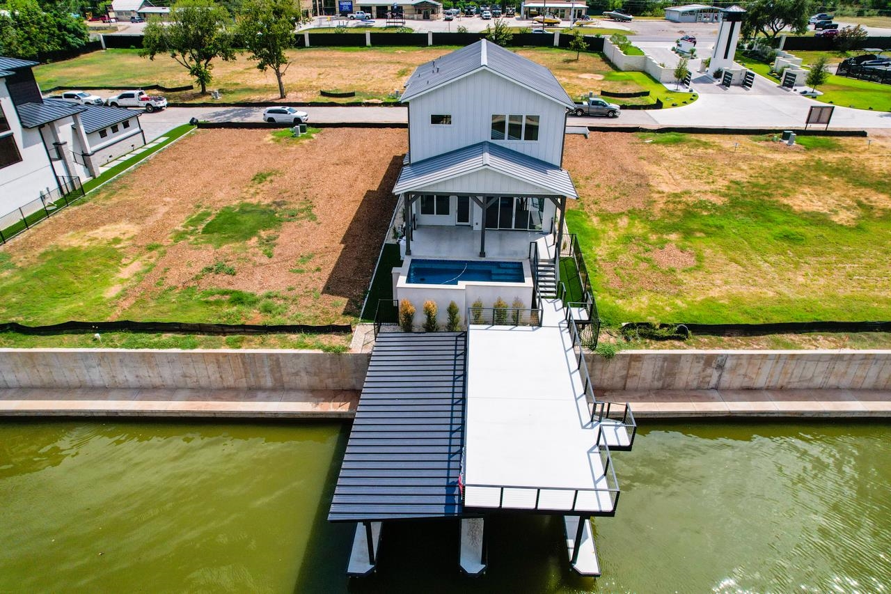 320 Lake Street Kingsland, TX 78639 - Photo 29 of 30 swimming pool view with a lake view
