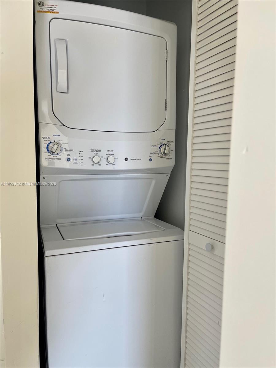 1725 West 60th Street, Unit F304 Hialeah, FL 33012 - Photo 20 of 26 a close view of washer and dryer