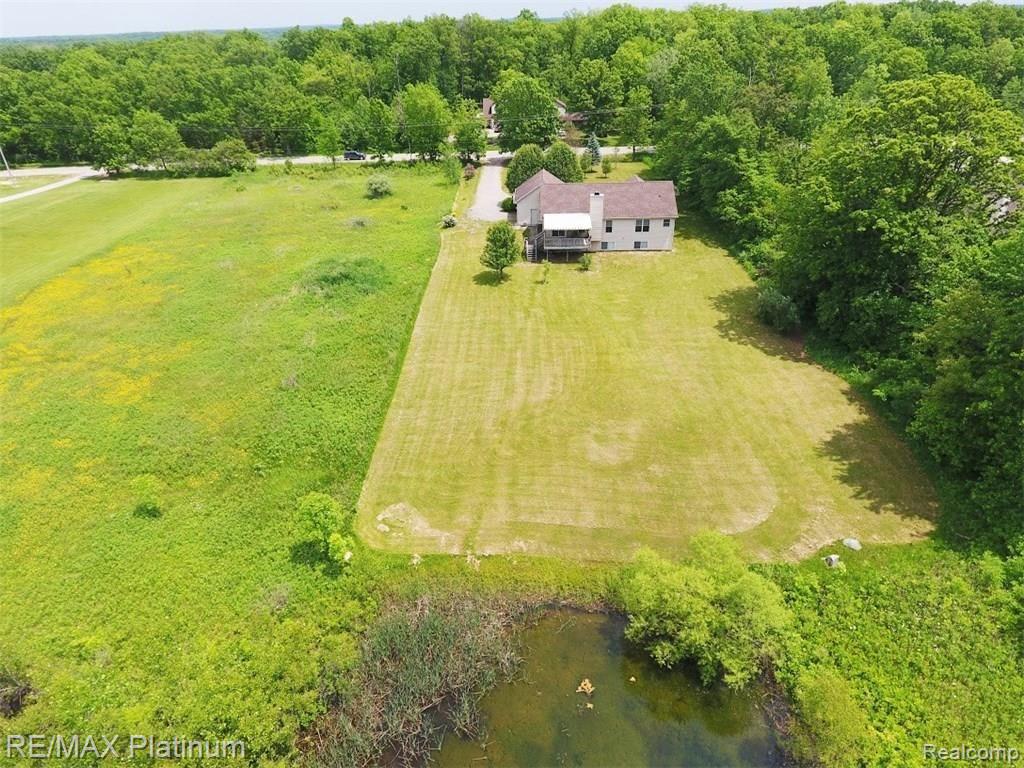 7011 Oak Grove Road Howell, MI 48855 - Photo 3 of 30 Back Yard View