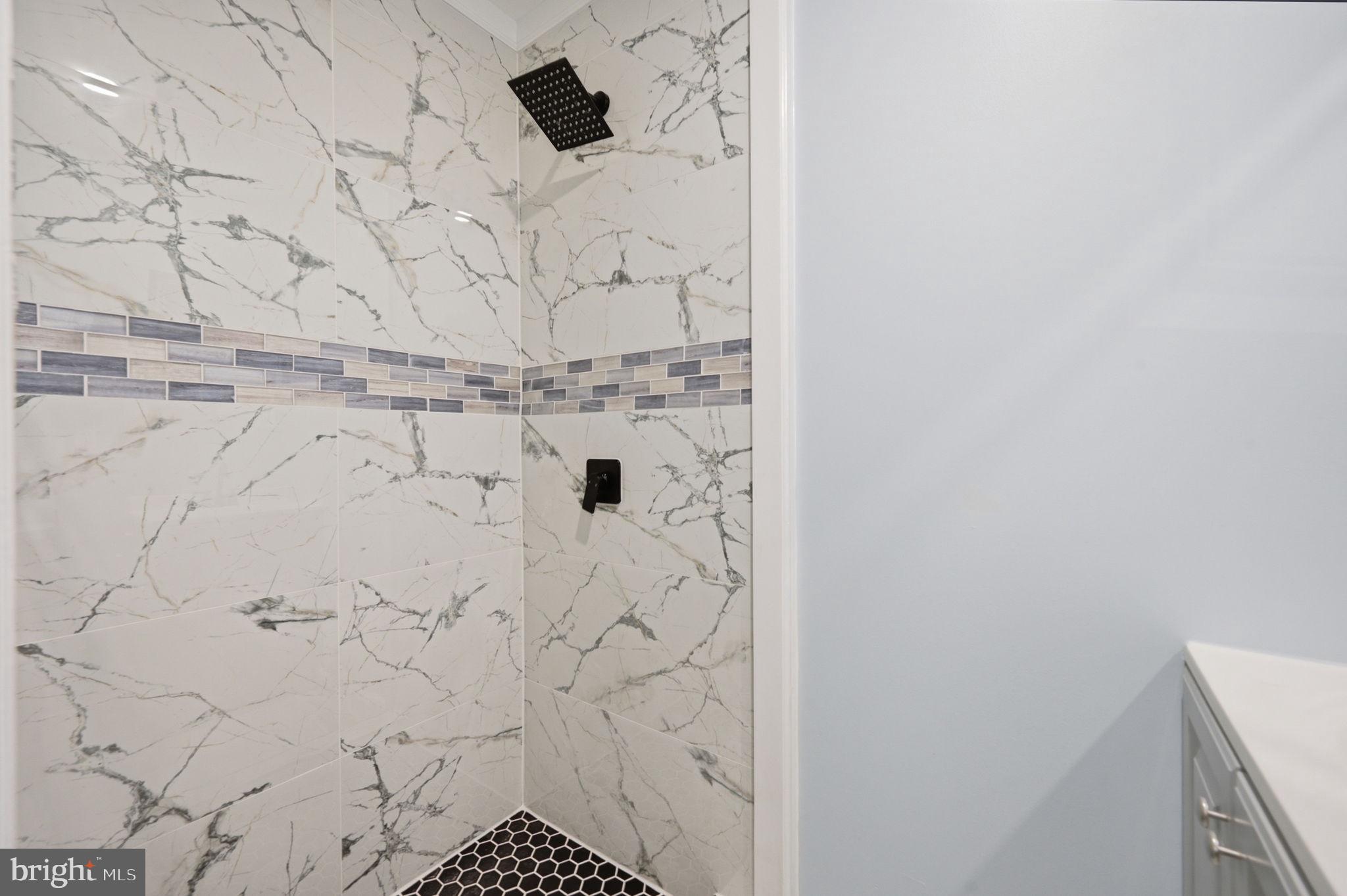517 Valcour Road Baltimore, MD 21228 - Photo 39 of 47 a bathroom with a shower