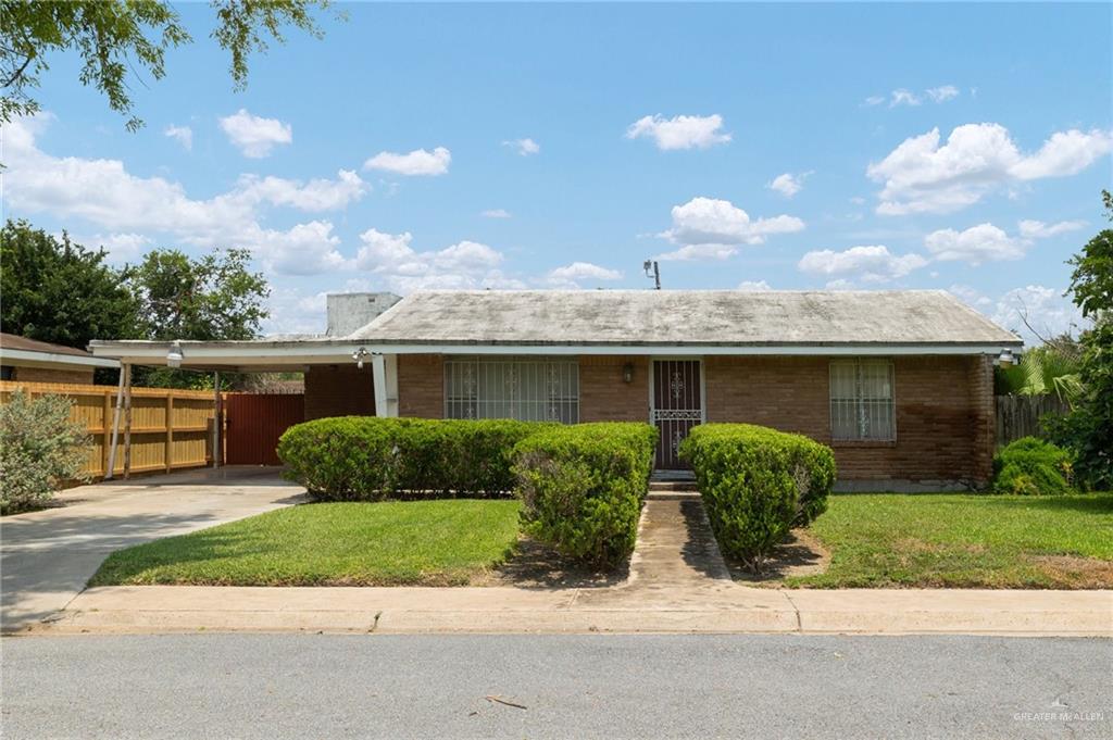 412 Cd Avenue McAllen, TX 78501 - Photo 1 of 1 a front view of a house with a yard and potted plants