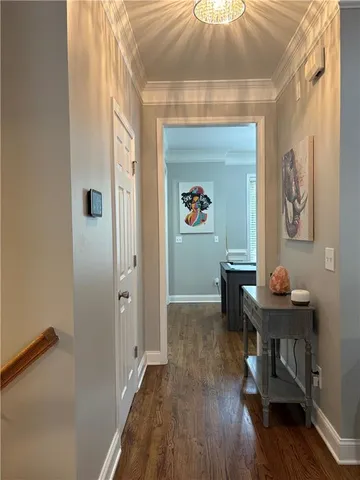 a workspace with furniture and wooden floor