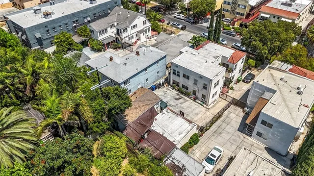an aerial view of a house with a garden