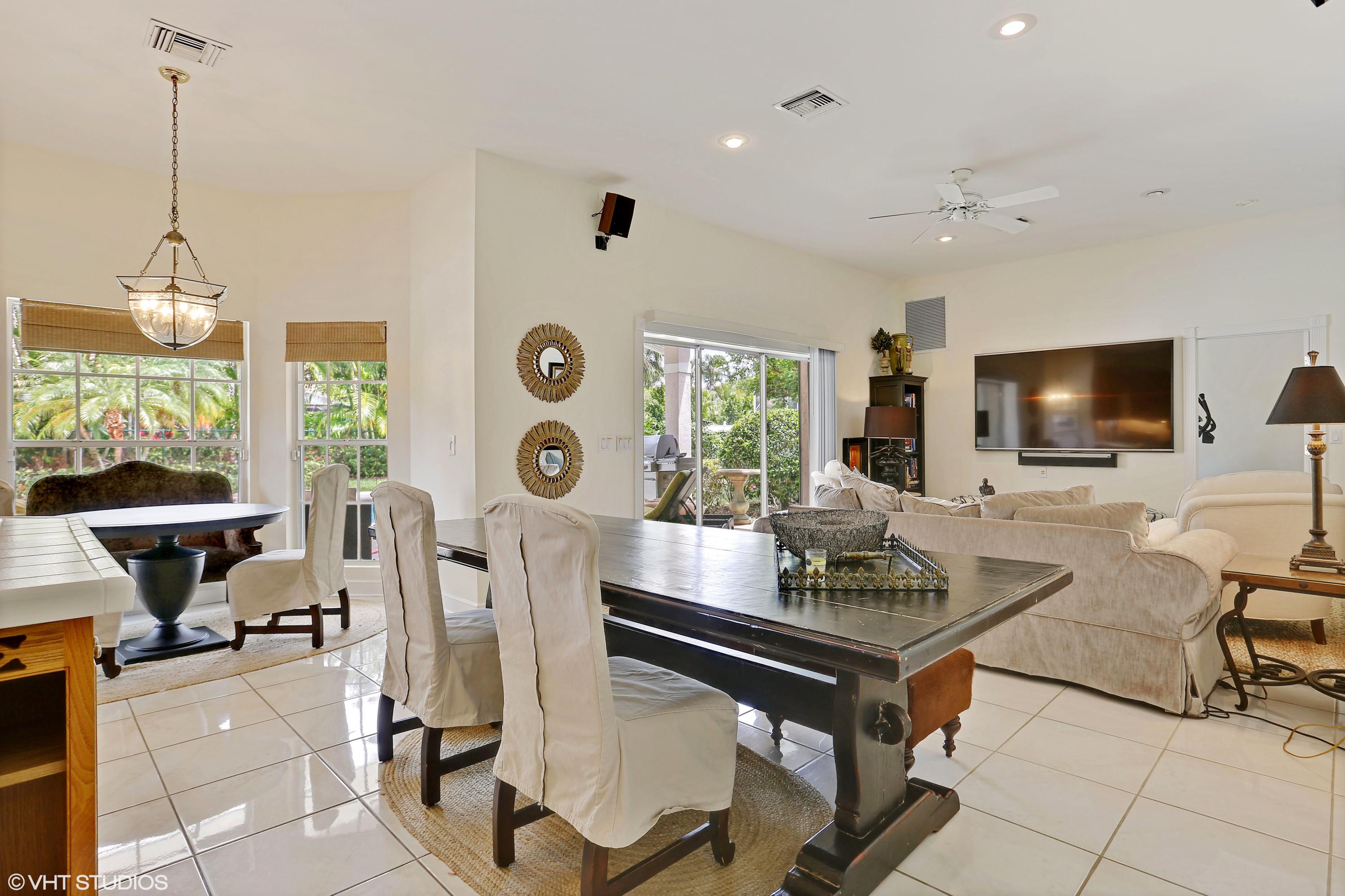 2235 Rabbit Hollowe Circle Delray Beach, FL 33445 - Photo 11 of 43 07_2235RabbitHollowCt_95_FamilyRoomDinin