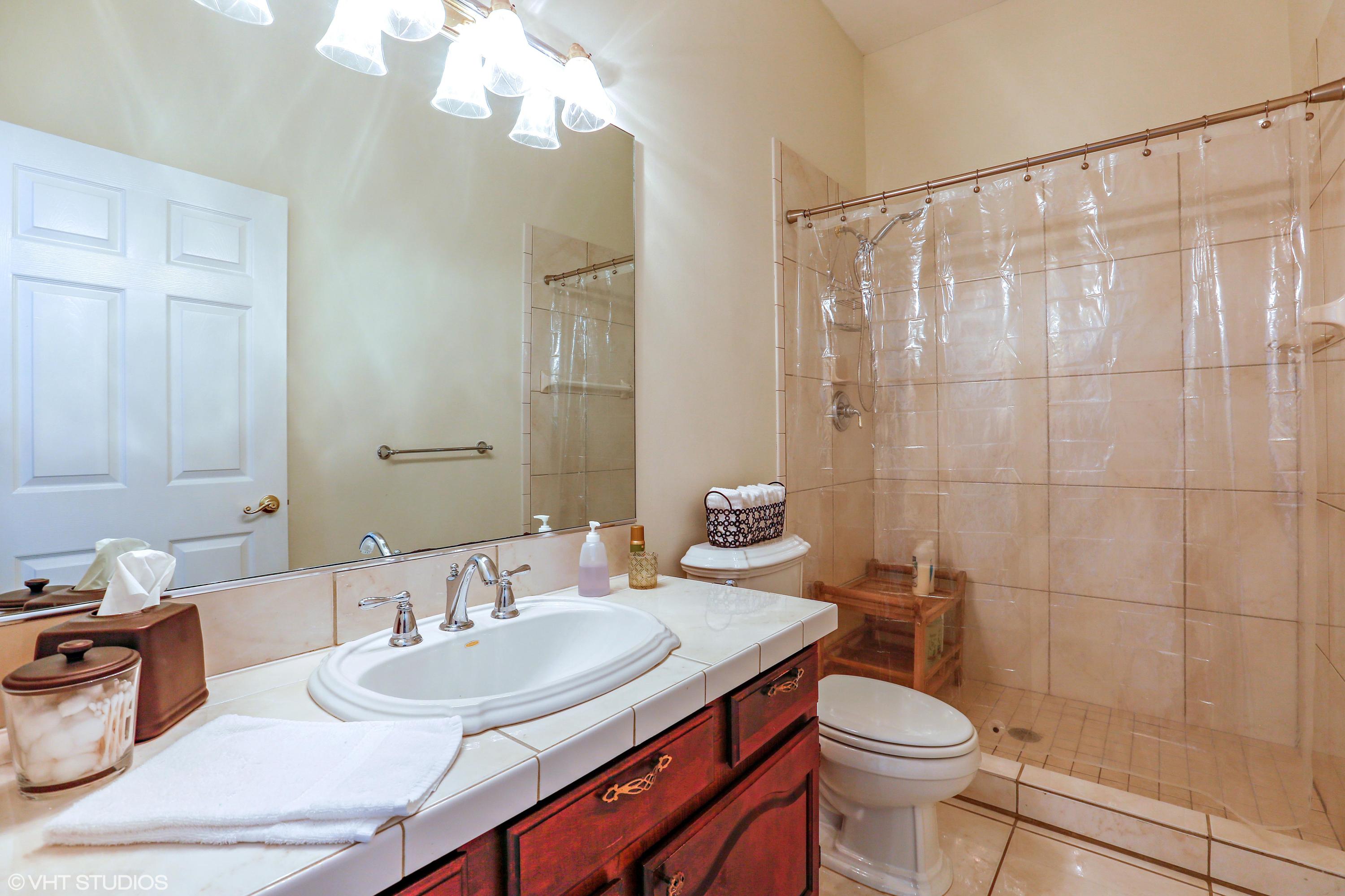 2235 Rabbit Hollowe Circle Delray Beach, FL 33445 - Photo 24 of 43 14_2235RabbitHollowCt_9_2ndBathroom_HiRe