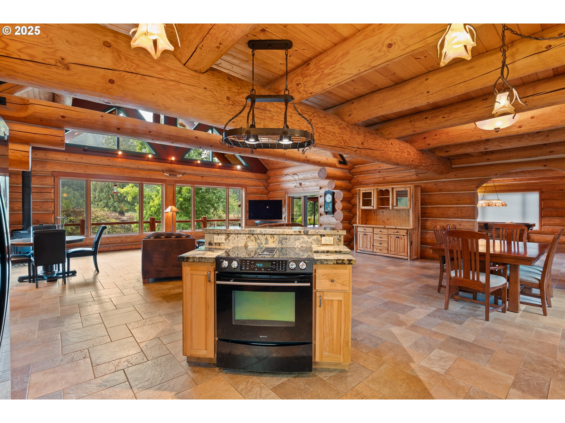 39582 Little Fall Creek Road Fall Creek, OR 97438 - Photo 11 of 44 a view of a dining room with furniture window and outside view