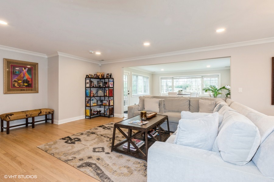 3205 Sprucewood Road Wilmette, IL 60091 - Photo 5 of 15 a living room with furniture and a wooden floor