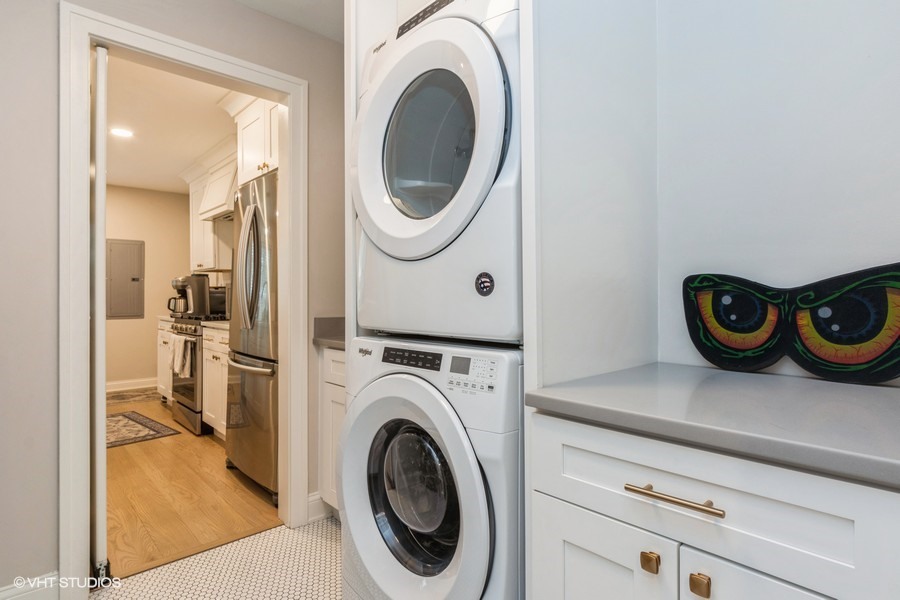 3205 Sprucewood Road Wilmette, IL 60091 - Photo 7 of 15 a view of a storage & utility room with washer and dryer