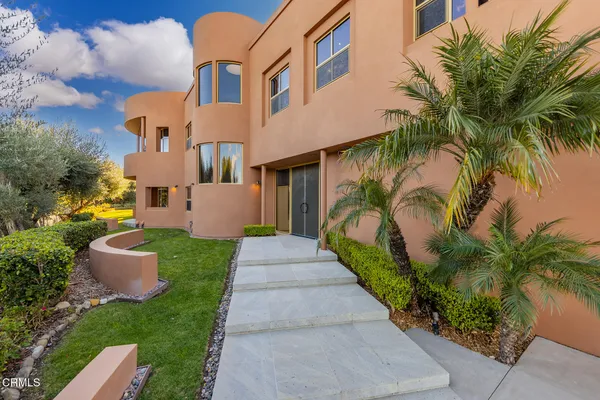 a view of a wooden door in front of a door