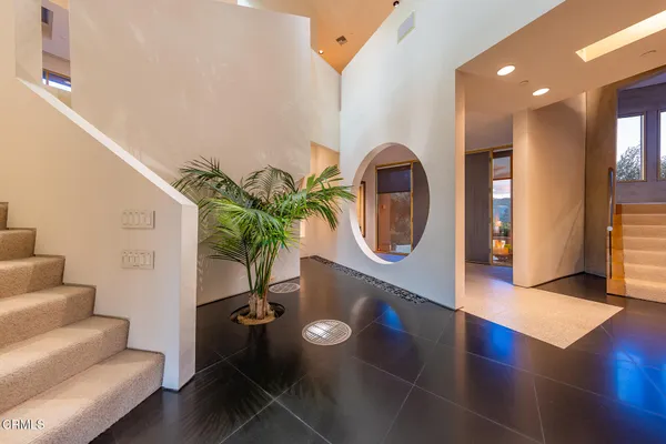 a living room with furniture and a couch