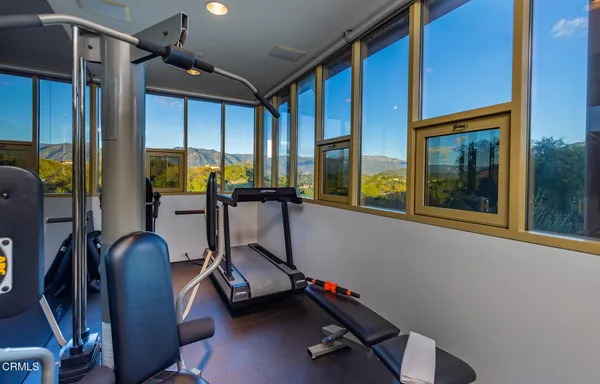 a bathroom with a tub and shower