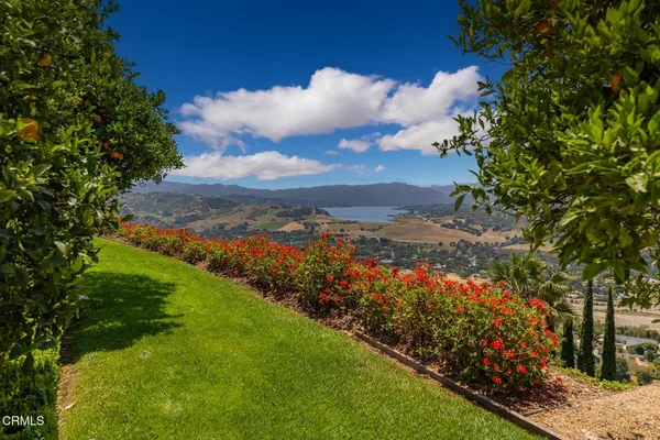 a view of a patio with swimming pool table and chairs