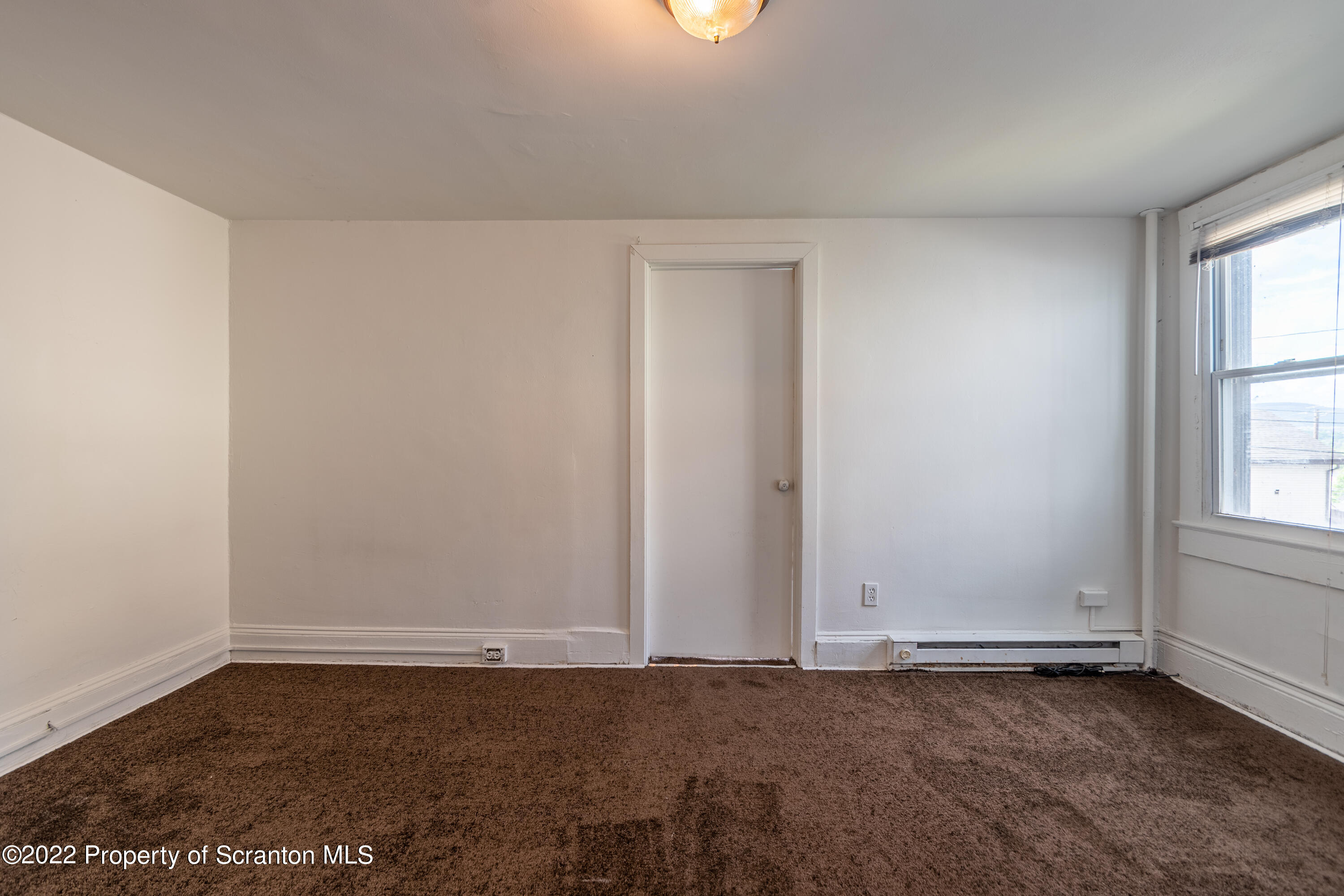 1509 Prospect Avenue Scranton, PA 18505 - Photo 11 of 28 an empty room with an empty space and window