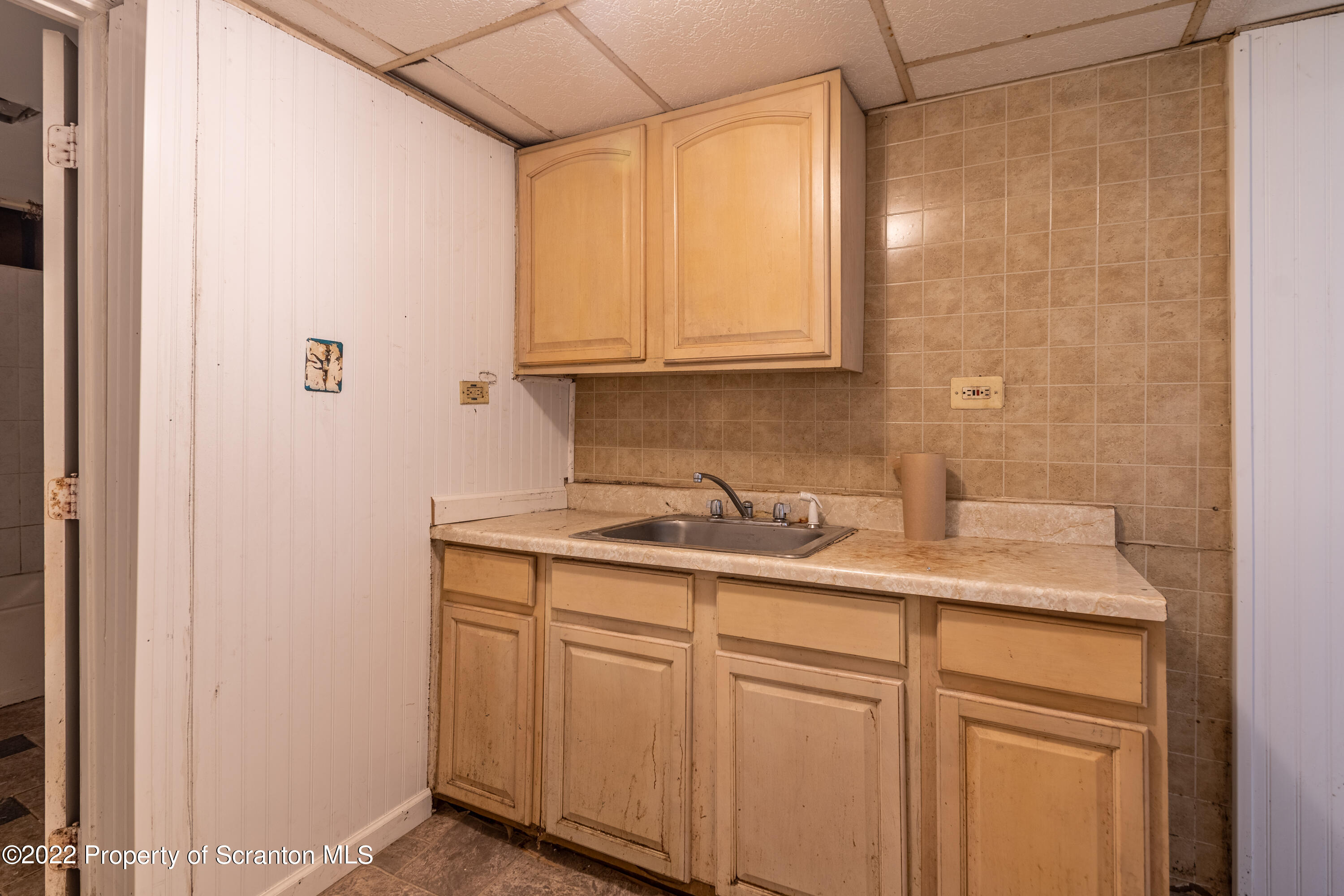 1509 Prospect Avenue Scranton, PA 18505 - Photo 16 of 28 a bathroom with a granite countertop sink and mirror