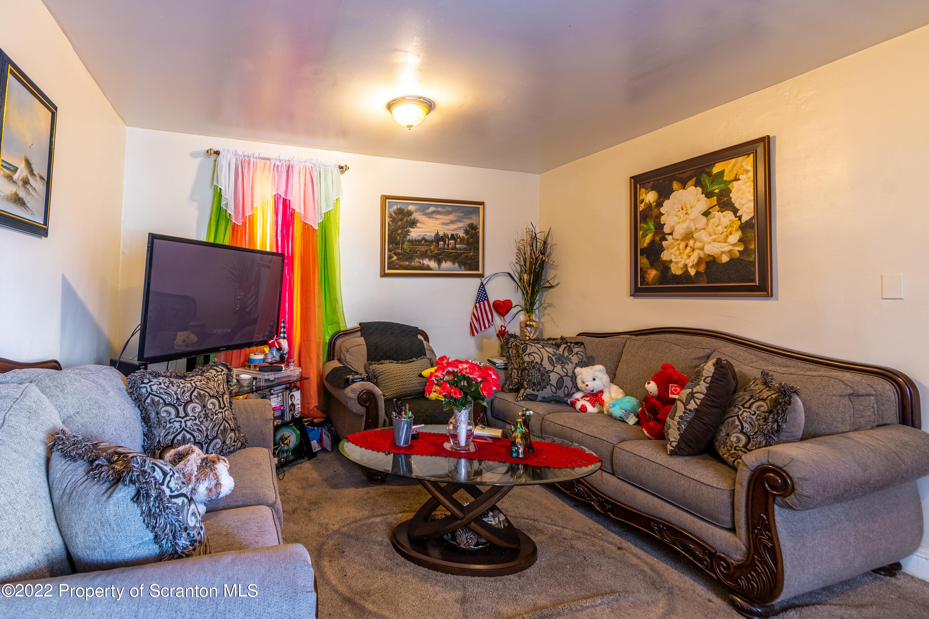 1509 Prospect Avenue Scranton, PA 18505 - Photo 21 of 28 a living room with furniture and a flat screen tv