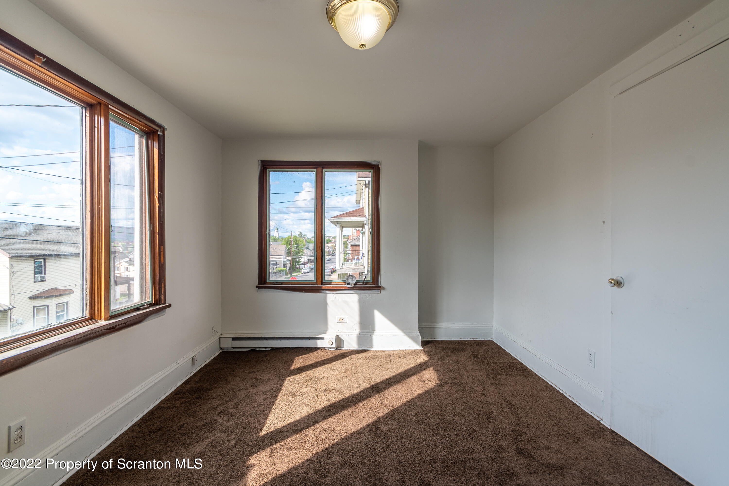 1509 Prospect Avenue Scranton, PA 18505 - Photo 9 of 28 wooden floor and window in a room
