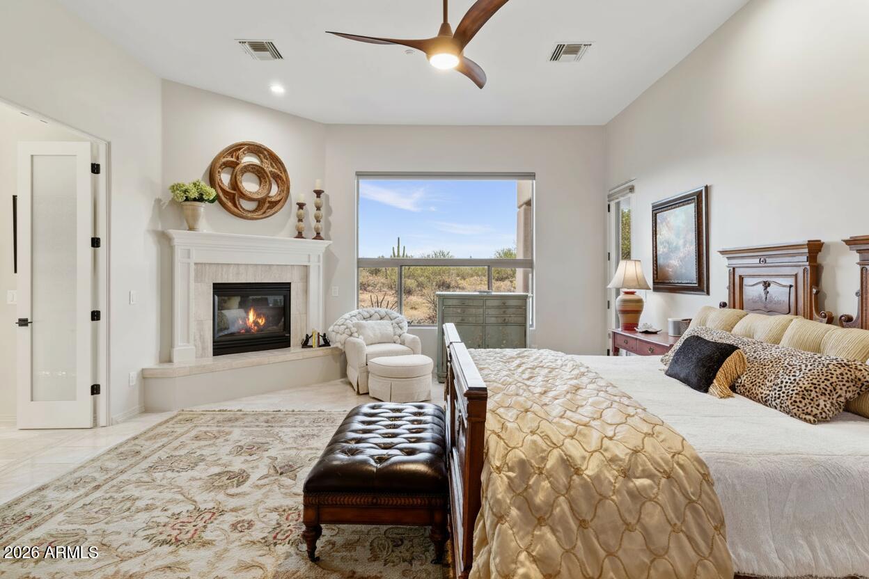 15730 East Eagle Crest Road Fountain Hills, AZ 85268 - Photo 29 of 77 Primary bedroom with fireplace