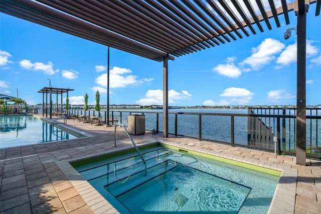 a view of a dining room with furniture and a window