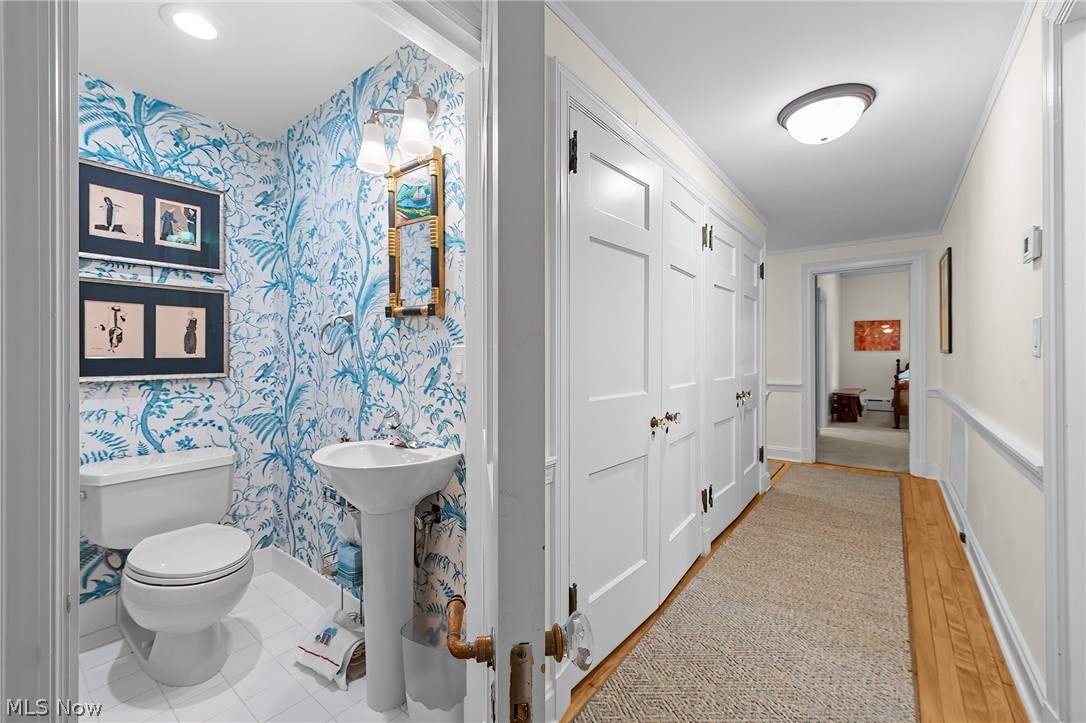 12546 Cedar Road, Unit 4 Cleveland Heights, OH 44106 - Photo 23 of 43 Center hall with hardwood floors, telephone nook, powder room and in-suite laundry