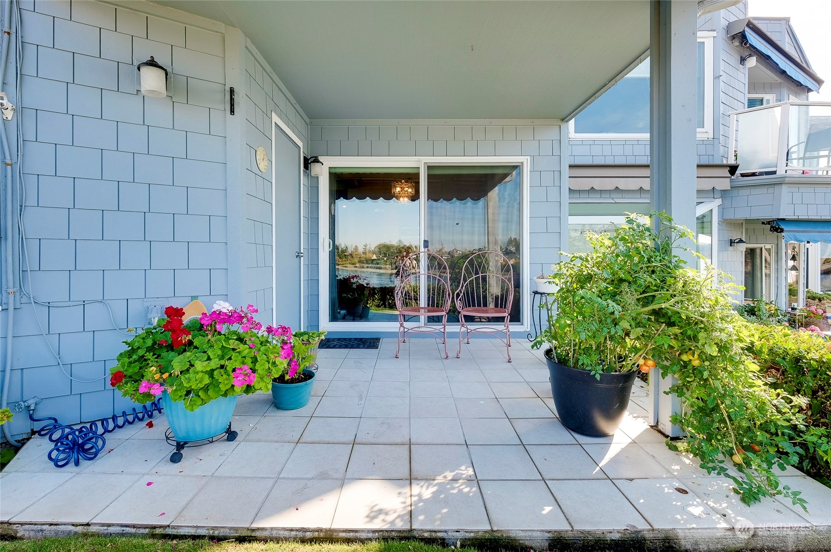 1135 Wheaton Way, Unit B3 Bremerton, WA 98310 - Photo 11 of 17 a house view with a potted plant