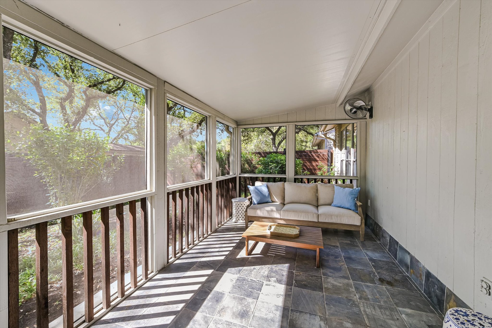 8121 Raintree Place Austin, TX 78759 - Photo 15 of 26 Screened-in porch off the back of the home.