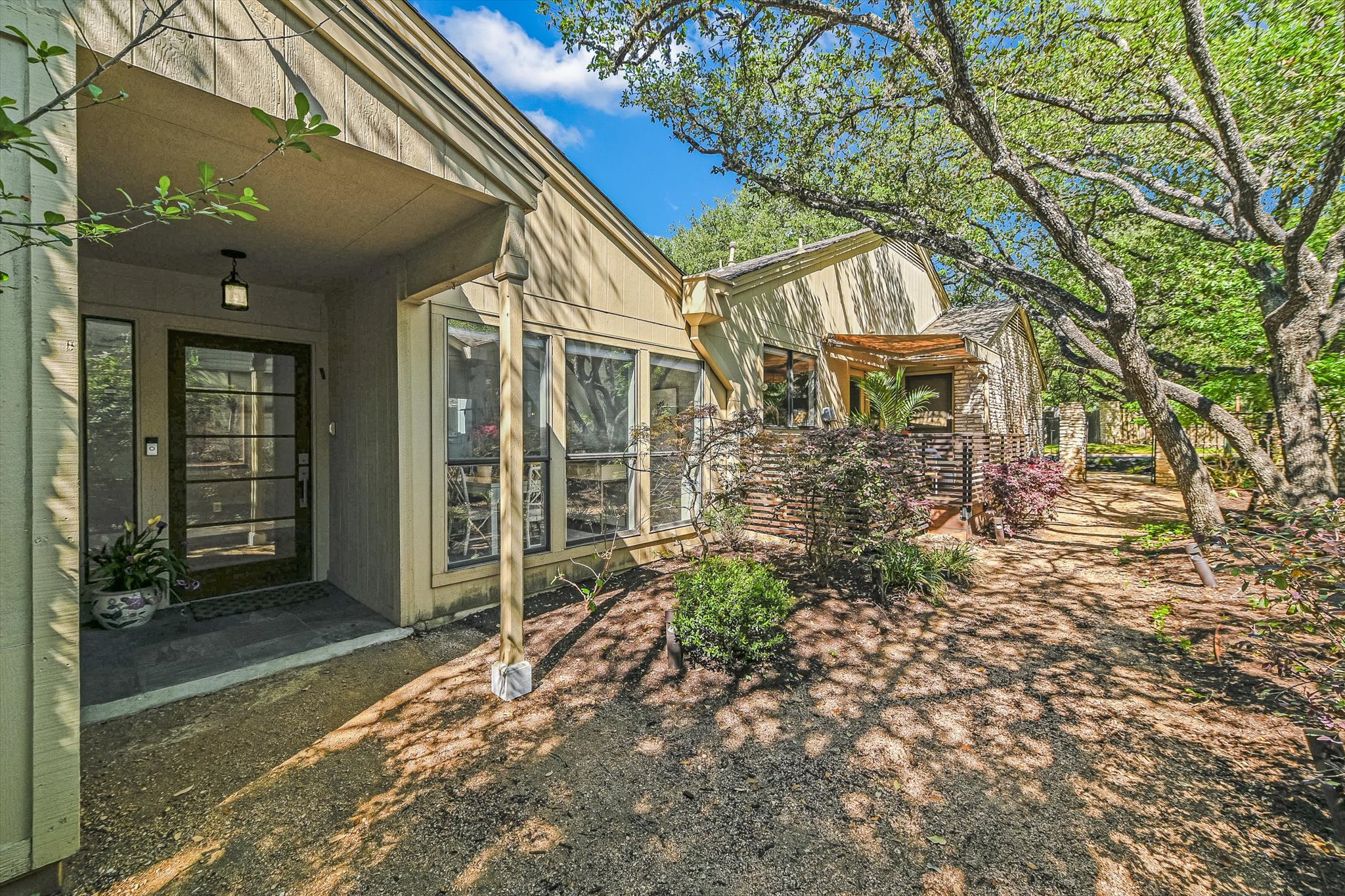 8121 Raintree Place Austin, TX 78759 - Photo 18 of 26 Designed for easy living, this low-maintenance lock-and-leave home offers the perfect blend of convenience and peace of mind.