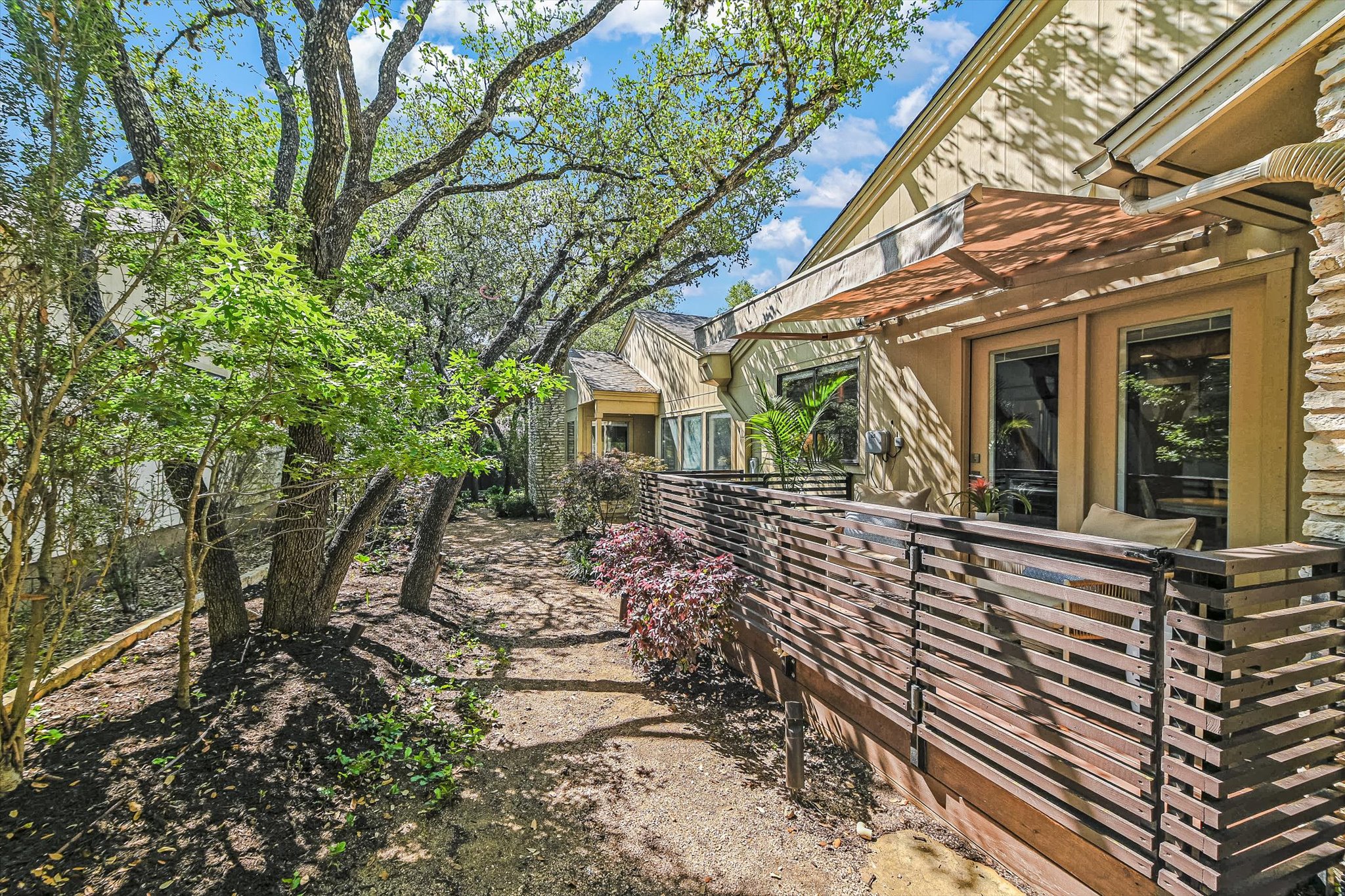 8121 Raintree Place Austin, TX 78759 - Photo 5 of 26 Perfect patio area off the kitchen for ones morning coffee.