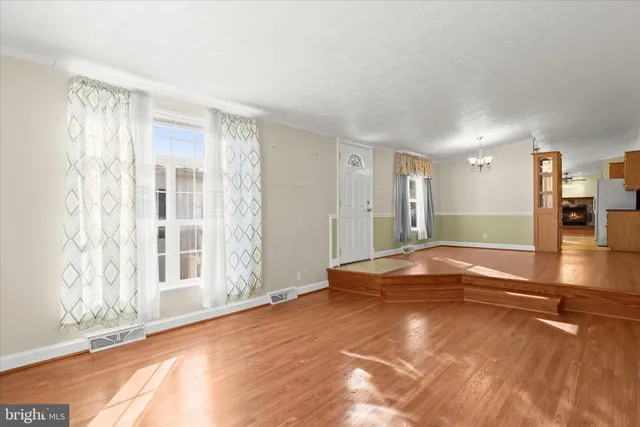 a view of an empty room with window