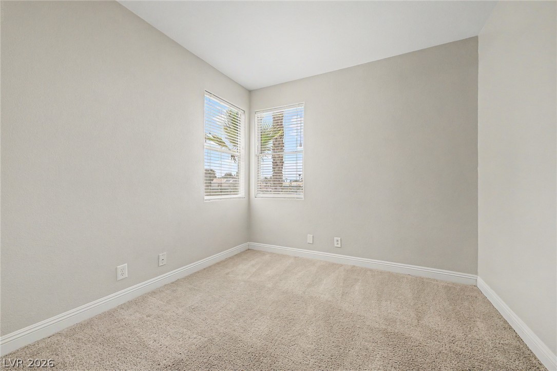 2316 Ramsgate Drive Henderson, NV 89074 - Photo 15 of 28 Two well-lit windows with blinds create a bright and inviting space.