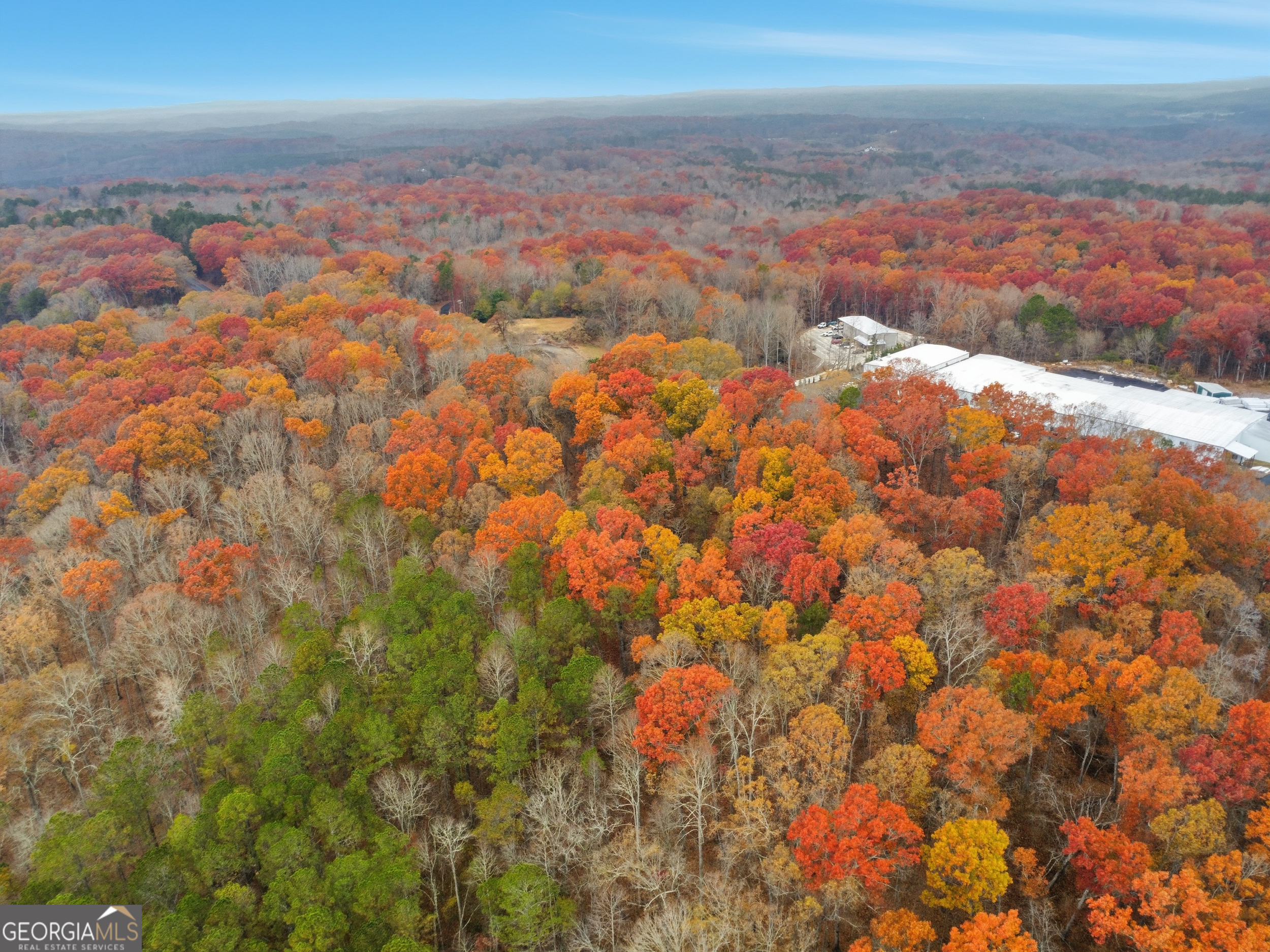 0 Hogan Pond Road Ball Ground, GA 30107 - Photo 3 of 7 a view of city and mountain
