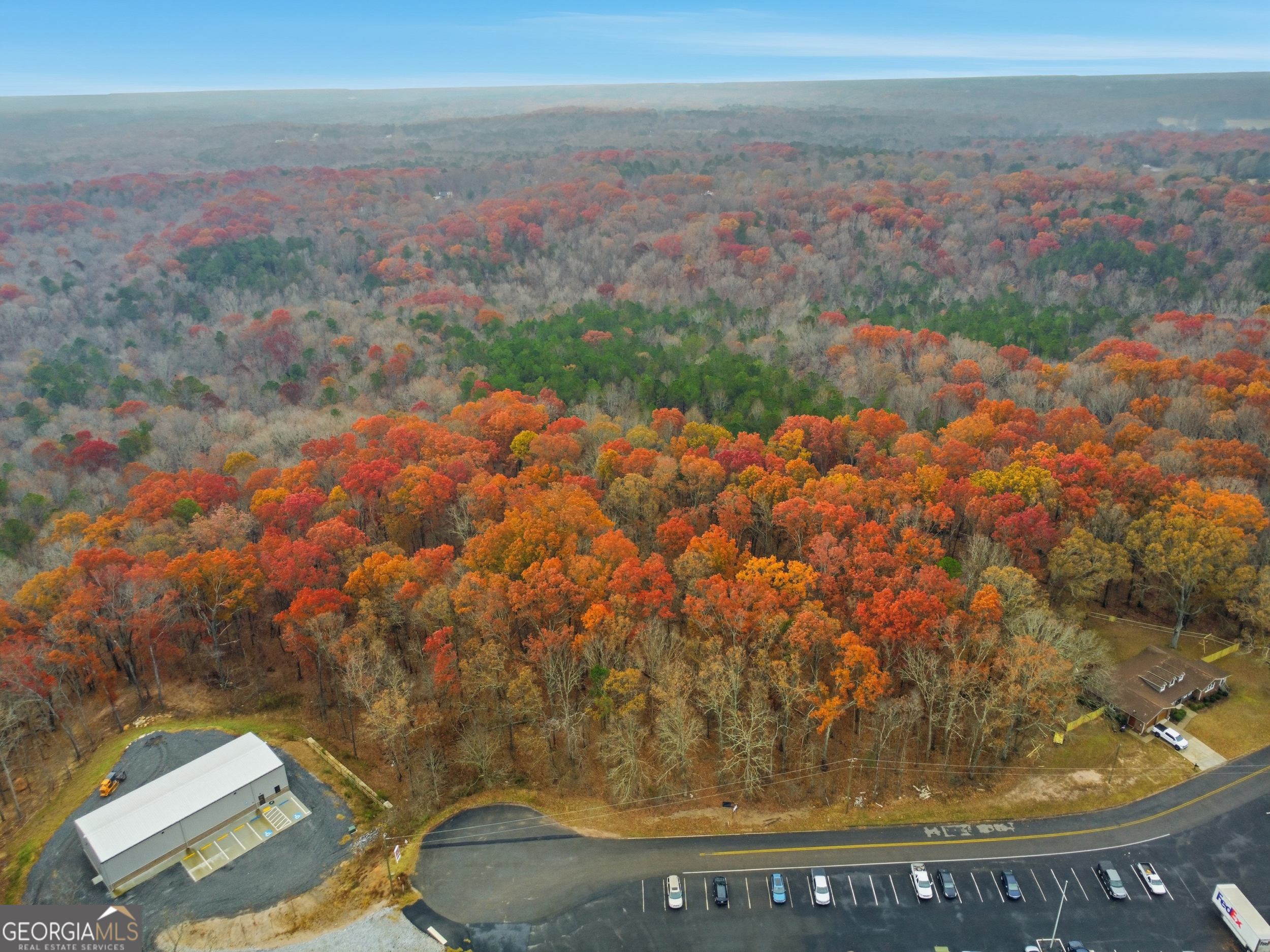 0 Hogan Pond Road Ball Ground, GA 30107 - Photo 5 of 7 a view of city from balcony