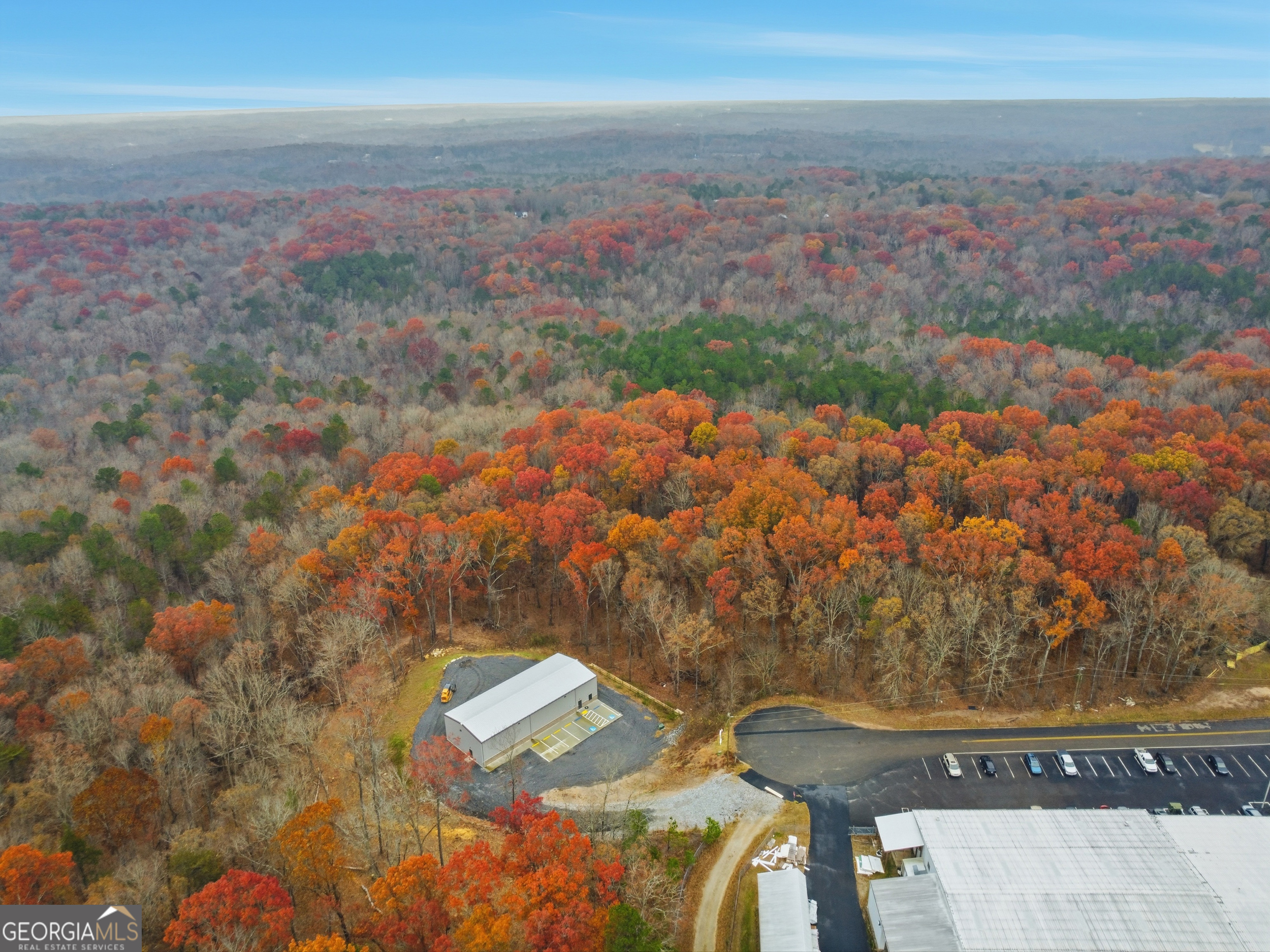 0 Hogan Pond Road Ball Ground, GA 30107 - Photo 6 of 7 a view of city and mountain